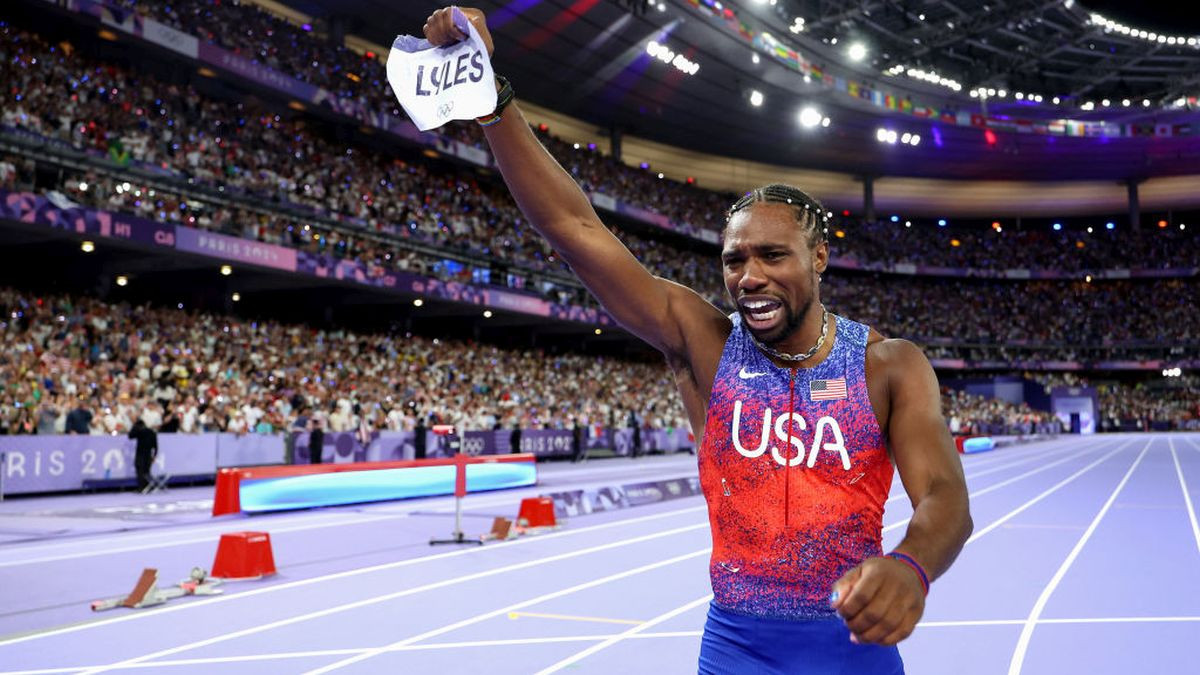 Noah Lyles celebrates after winning the men's 100m final. GETTY IMAGES