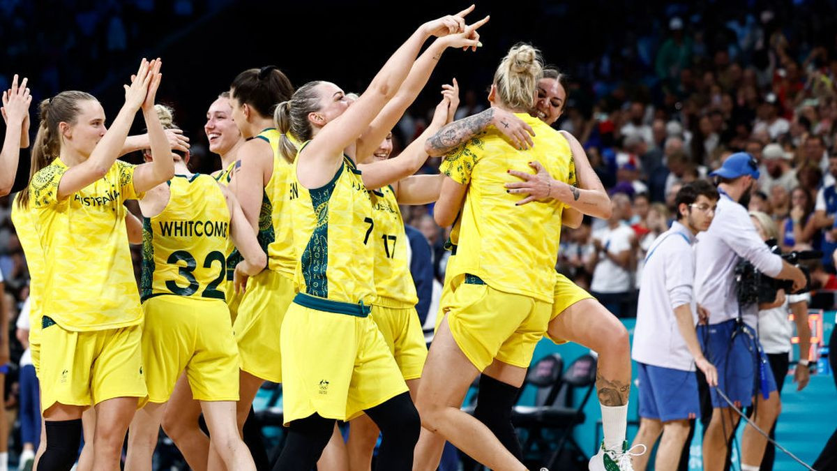 Australia's Team celebrate at the end of the women's preliminary round. GETTY IMAGES