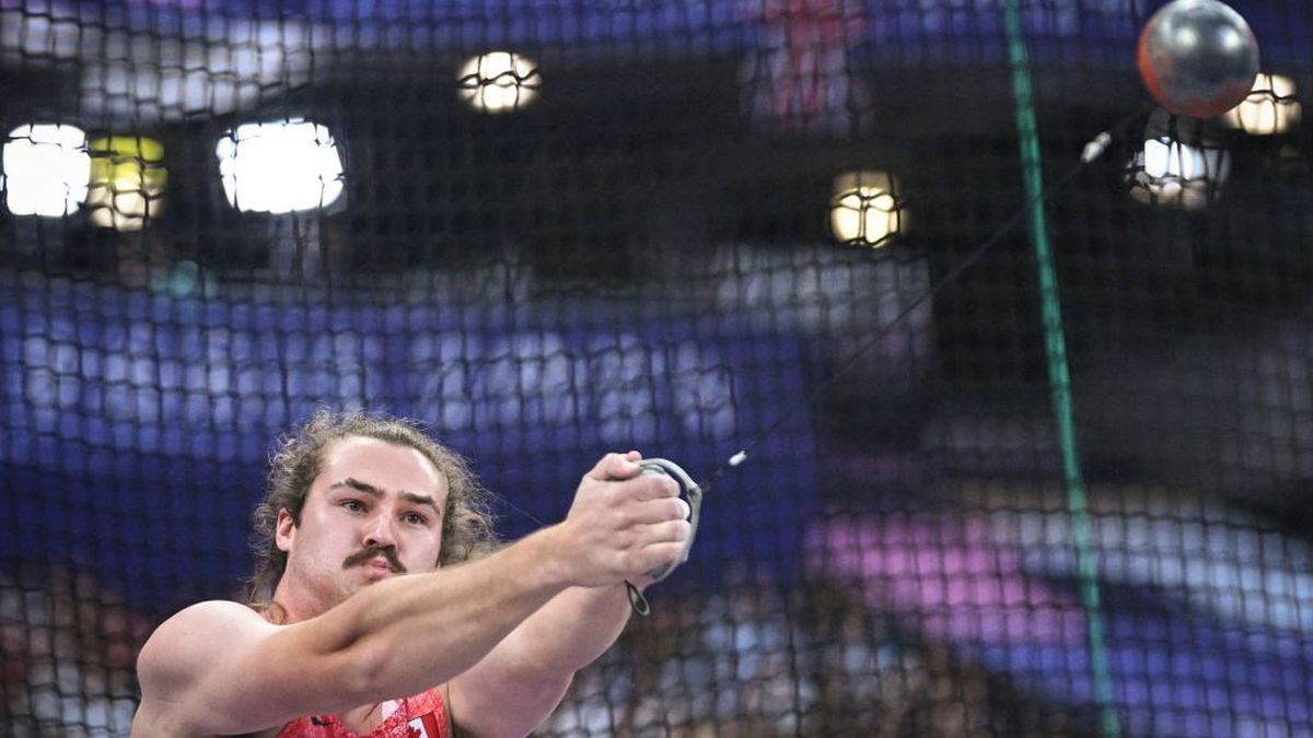Ethan Katzberg competes in the men's hammer throw final. GETTY IMAGES