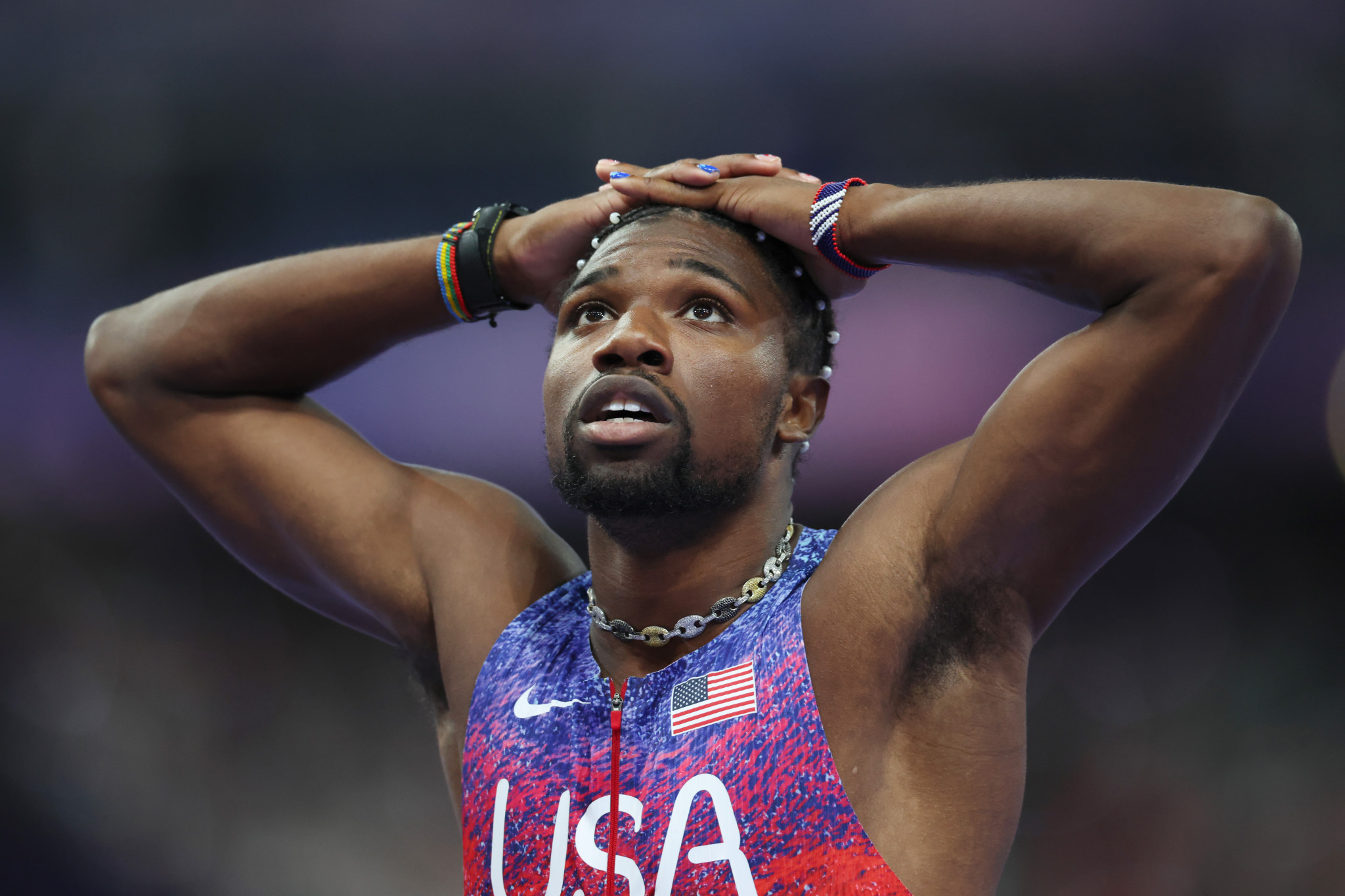 Noah Lyles had to wait to celebrate. GETTY IMAGES