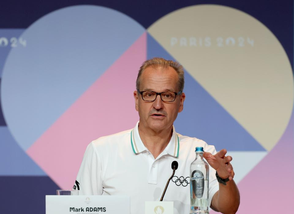 Director of Communications for International Olympic Committee (IOC) Mark Adams speaks during a press conference. GETTY IMAGES