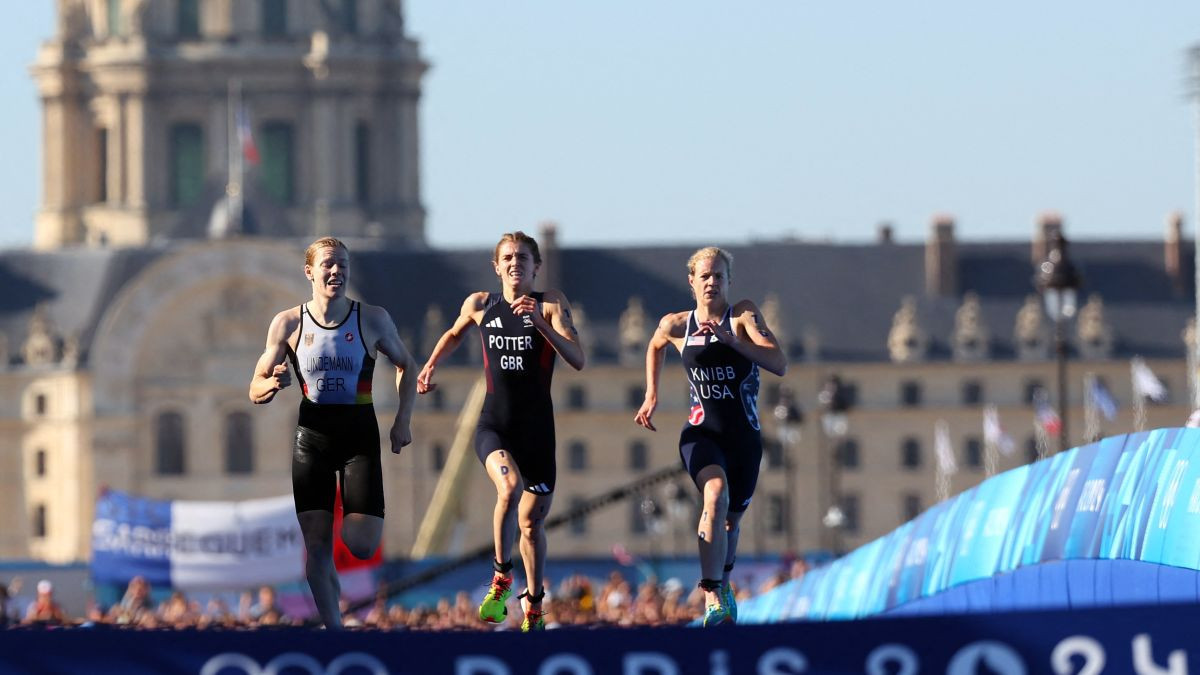 Germany's Lindemann crosses the finish in first place followed by Britain's Potter and US' Knibb. GETTY IMAGES