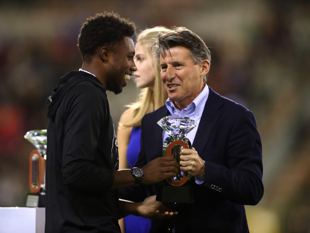 Sebastian Coe had a few words to say to Noah Lyles after his 100m victory. GETTY IMAGES
