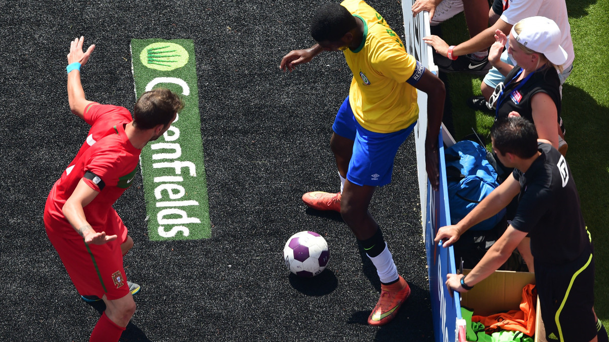 Brazil against Portugal at the 2014 Homeless World Cup. GETTY IMAGES