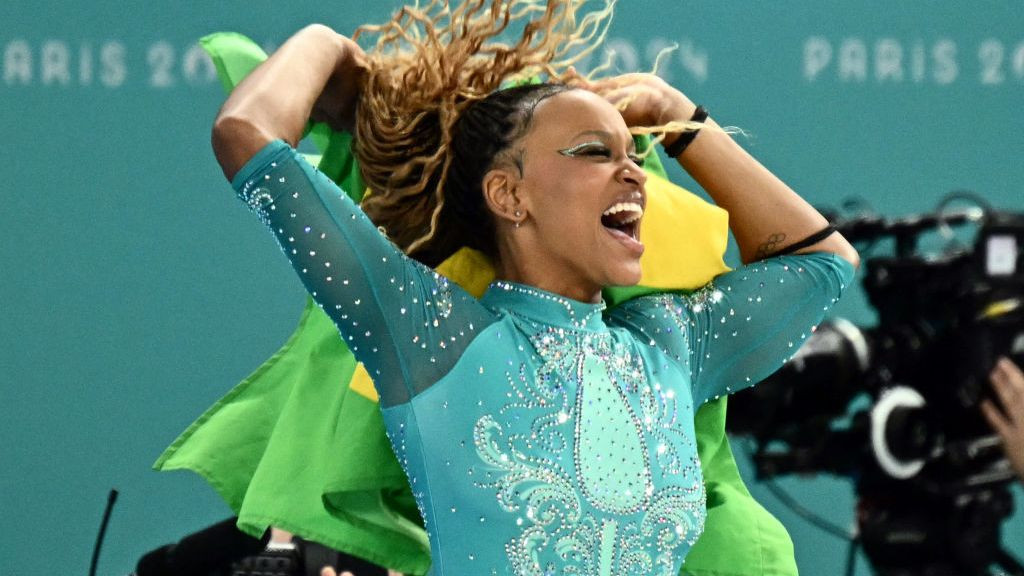Brazil's Rebeca Andrade celebrates winning the gold medal. GETTY IMAGES