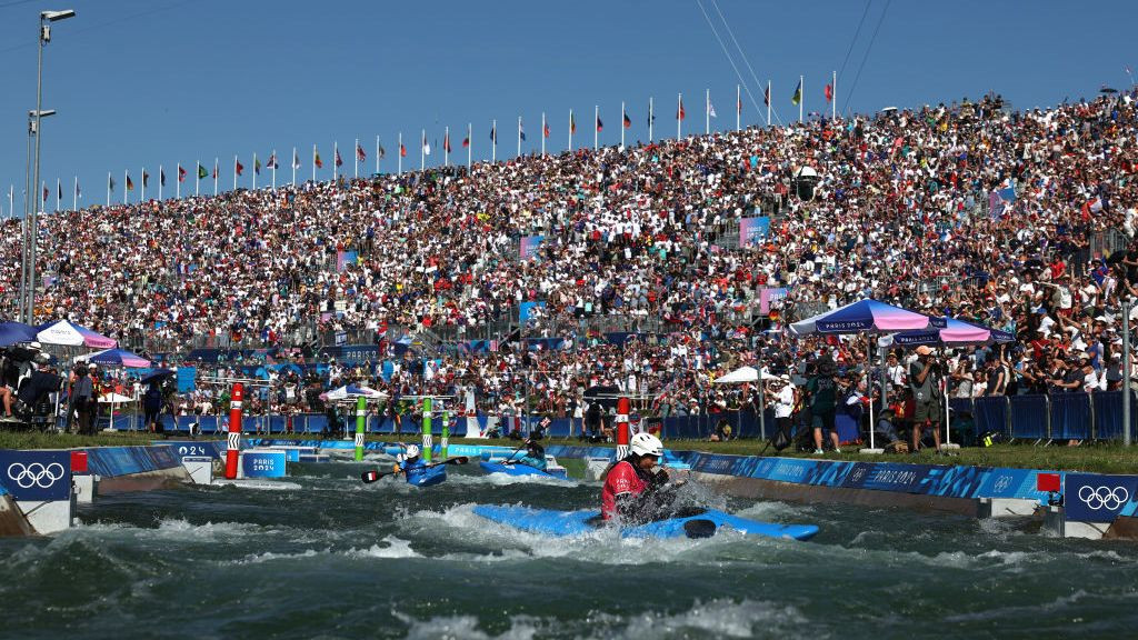 Noemie Fox of Team Australia reacts after winning gold in the Canoe Slalom Women's Kayak Cross Final . GETTY IMAGES