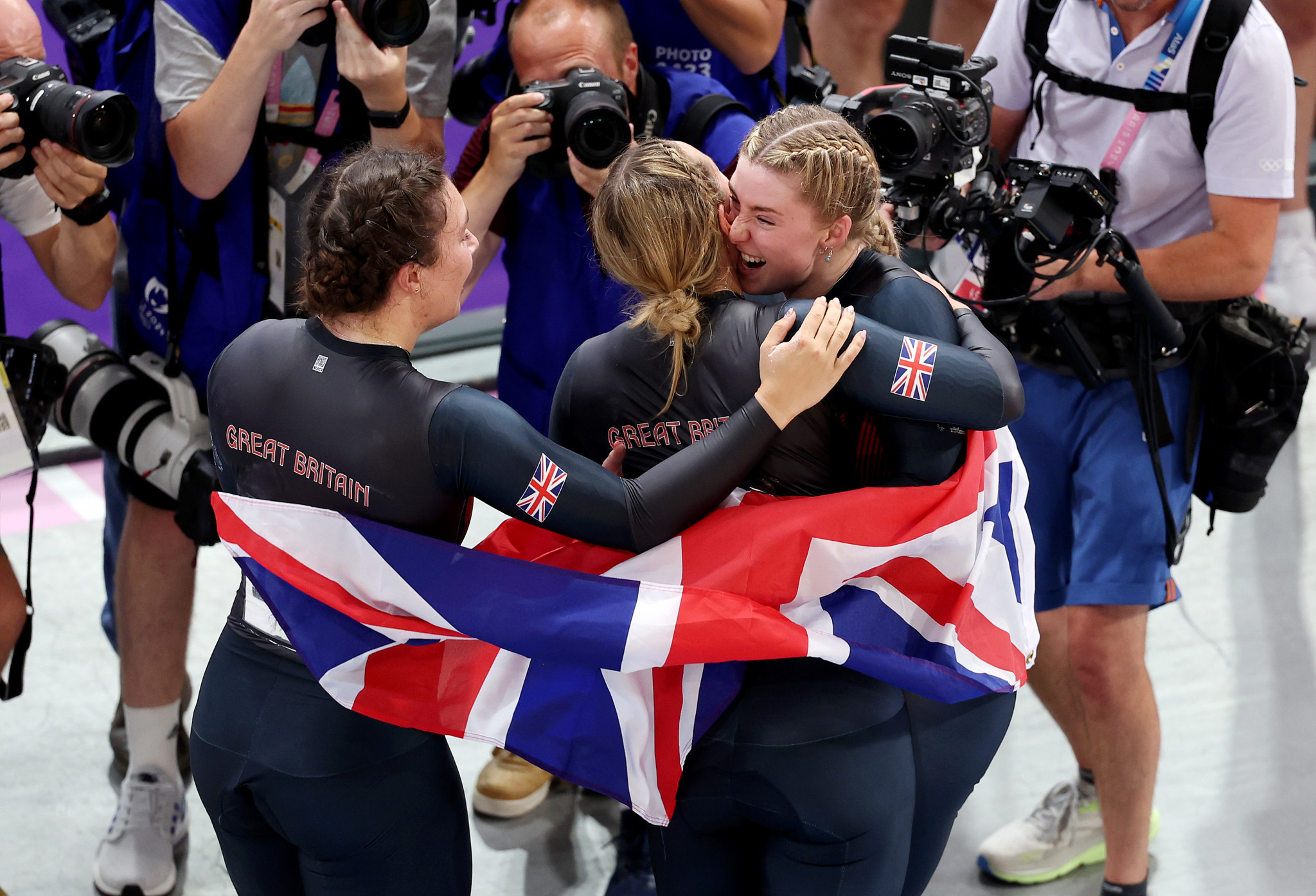 Katy Marchant, Sophie Capewell and Emma Finucane of Team Great Britain celebrate winning the Women’s Team Sprint event at the Paris 2024 Olympic Games. GETTY IMAGES