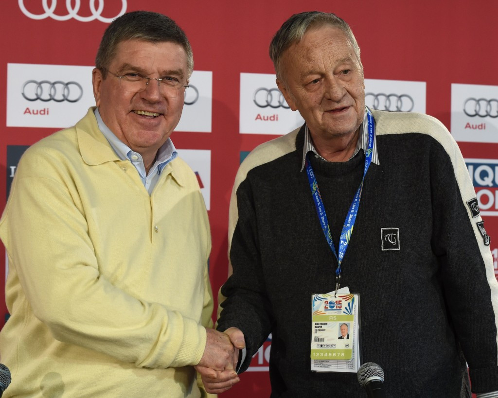 A contest will take place to replace interim President Gian-Franco Kasper (pictured, right, with IOC President Thomas Bach) during the General Assembly in Sochi ©Getty Images