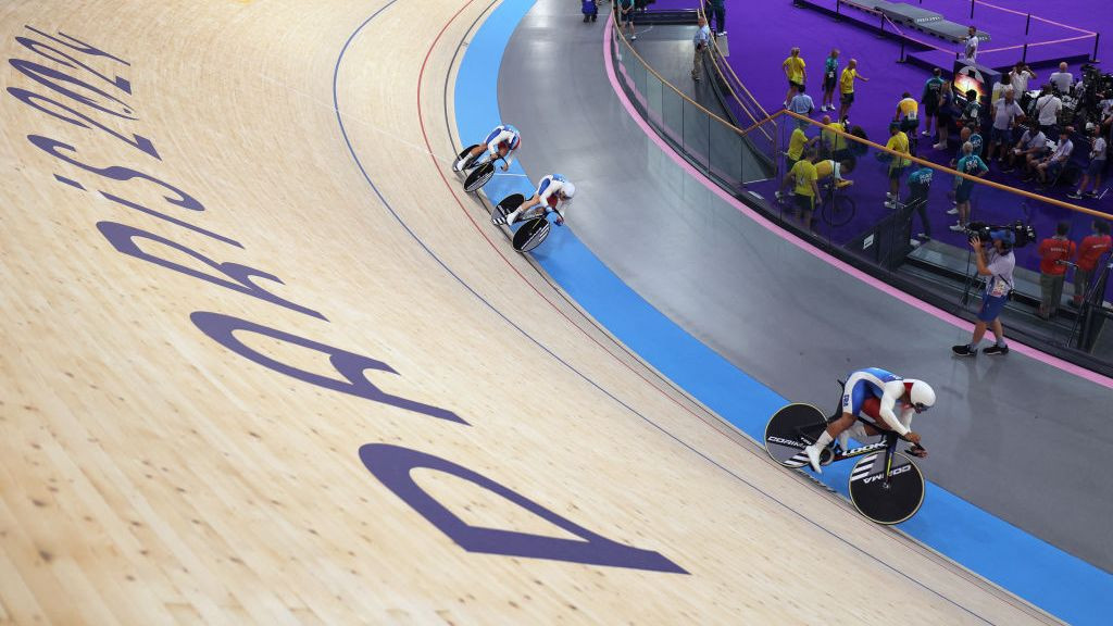 France's Florian Grengbo, France's Sebastien Vigier and France's Rayan Helal compete in a men's track cycling team sprint