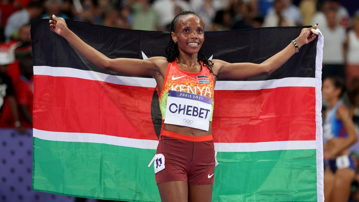 Beatrice Chebet of Team Kenya celebrates winning the gold medal. GETTY IMAGES