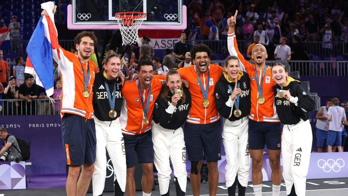 Men's and Women's 3x3 basketball gold medalists. GETTY IMAGES