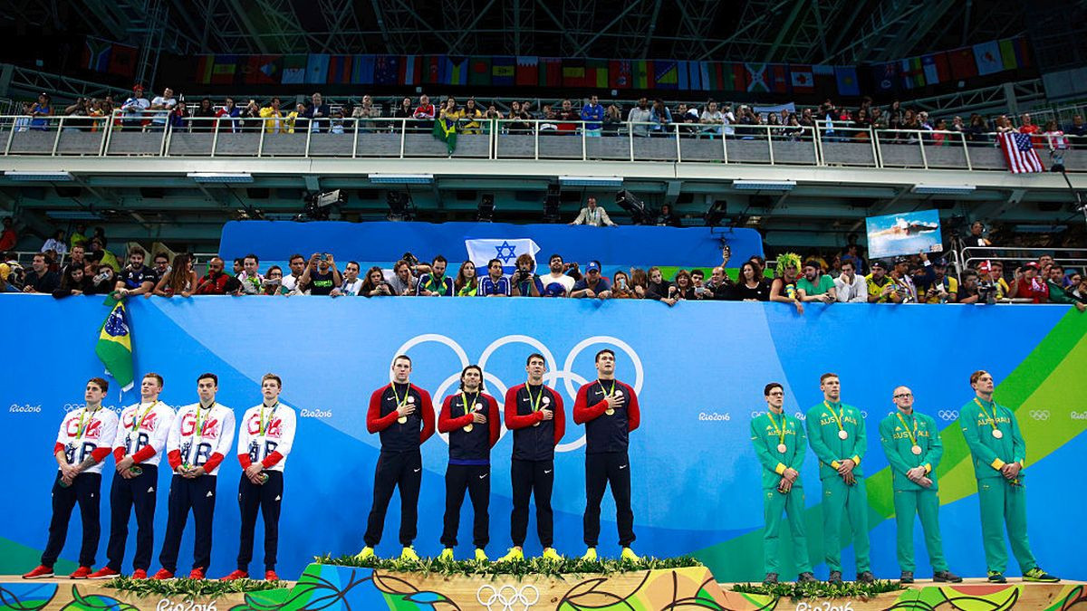 Silver medalists led by Adam Peaty of Great Britain, Gold medalists starring Michael Phelps, of the United States and Bronze medalists of Australia pose on the podium during the medal ceremony in Rio 2016. GETTY IMAGES