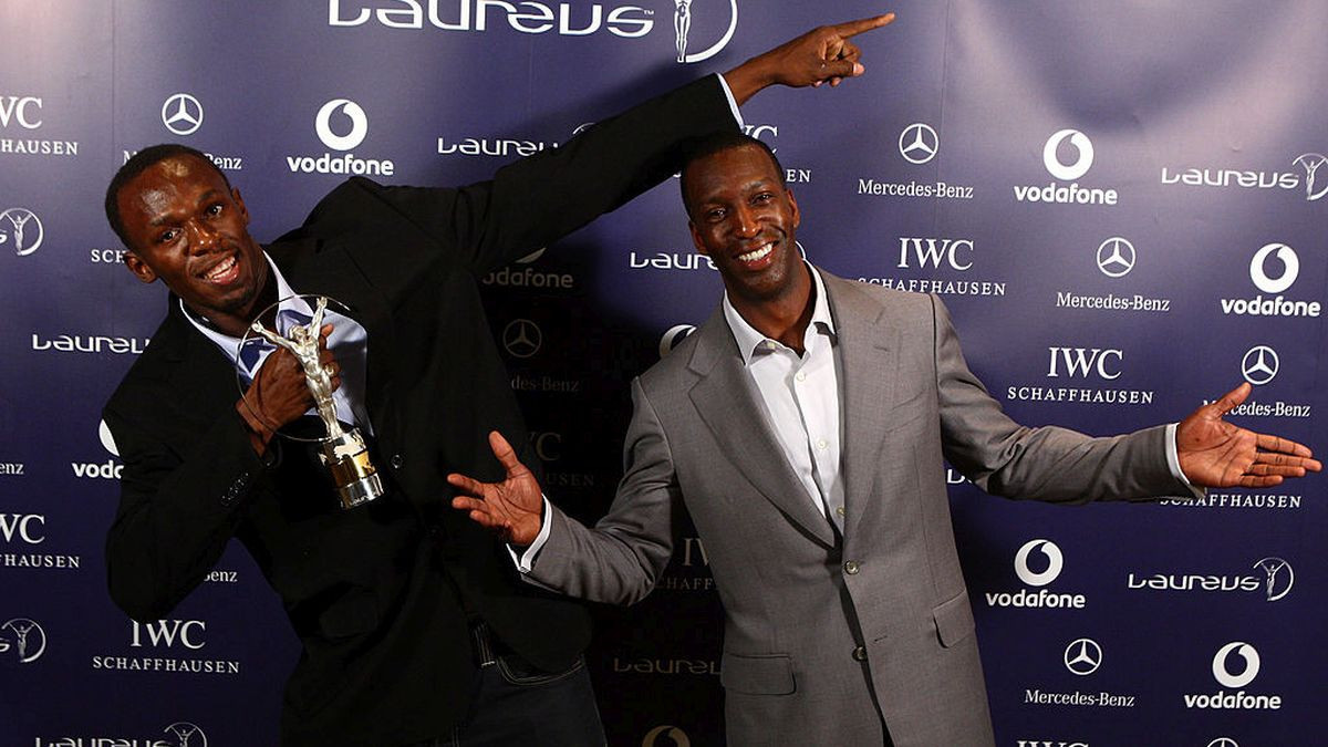 Usain Bolt World record holder for 100m and 200m, poses with Academy Member Michael Johnson. GETTY IMAGES.