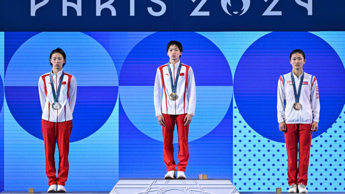 Quan Hongchan, Chen Yuxi, and Kim Mi Rae, Olympic podium for the 10m platform. GETTY IMAGES