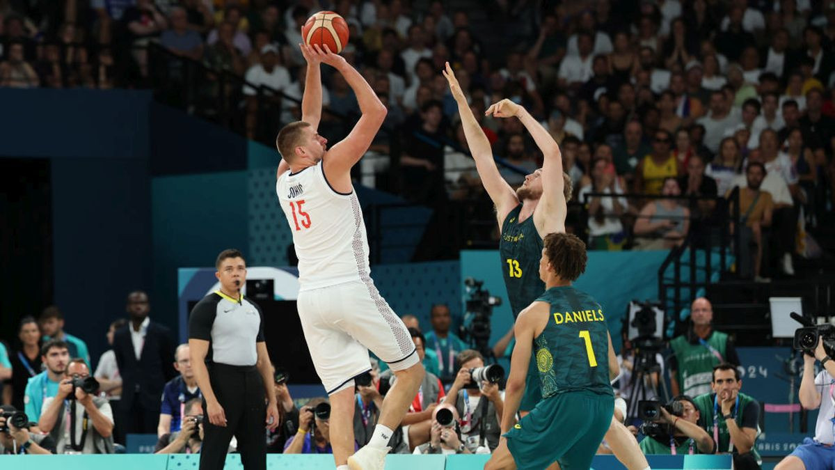 Nikola Jokic takes a shot over Jock Landale. GETTY IMAGES