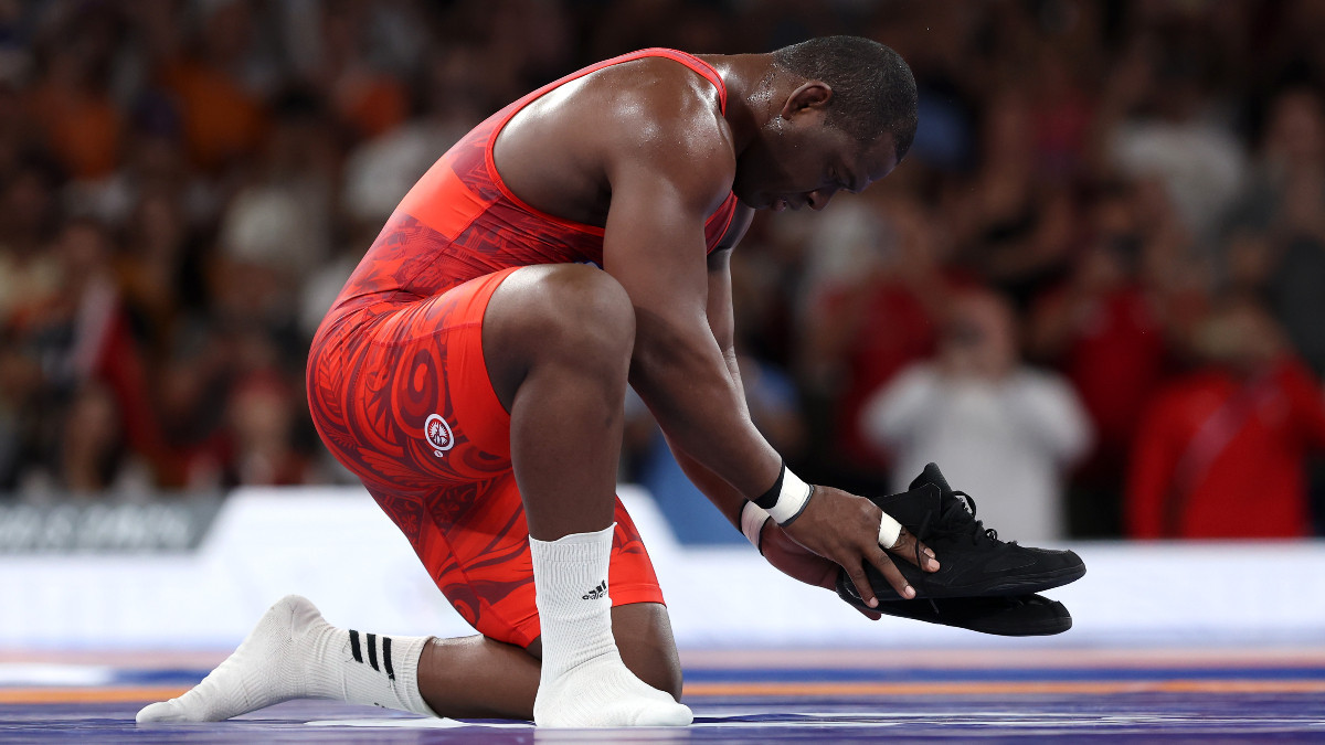 Mijain Lopez left his shoes on the mat after the final bout. GETTY IMAGES