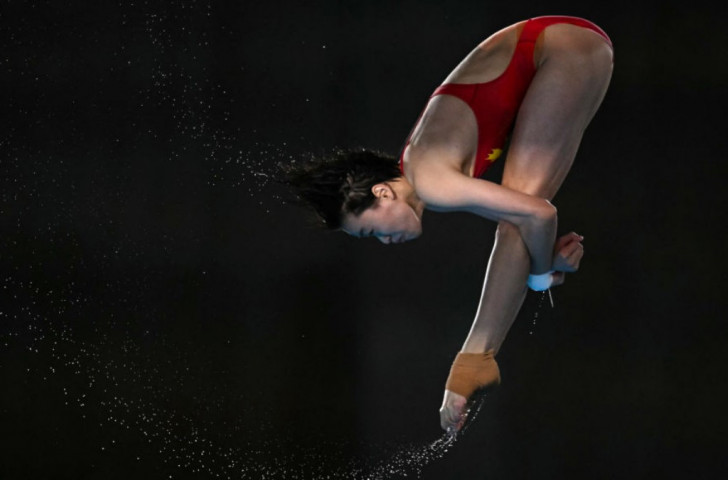 Quan Hongchan, 17-year-old prodigy with three diving golds. GETTY IMAGES