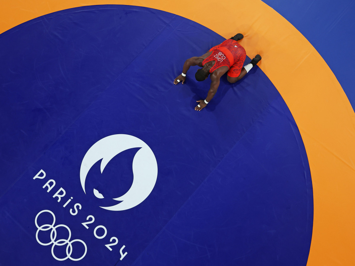 Mijain Lopez Nunez of Team Cuba celebrates victory and fifth Olympic Gold following the Wrestling Men's Greco-roman 130kg Gold Medal match at the Paris 2024 Olympic Games. GETTY IMAGES