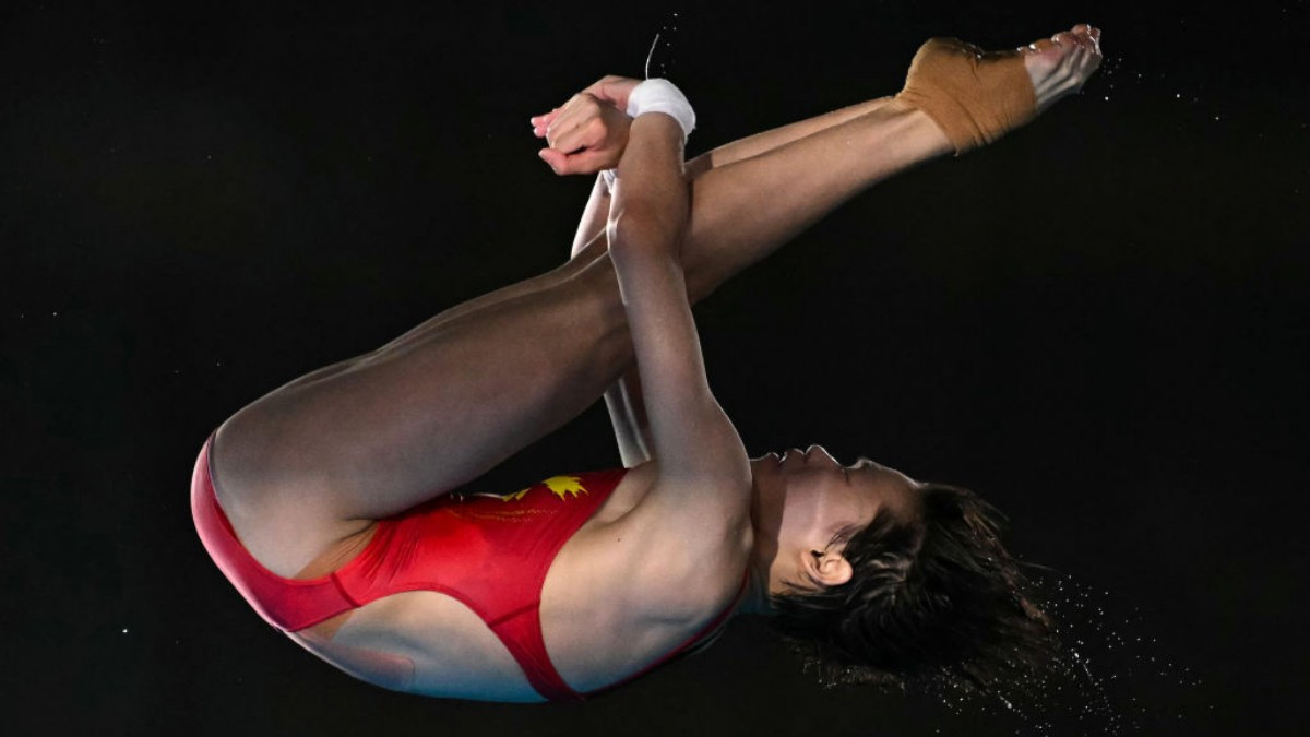 Hongchan soars from the diving board at Paris 2024 GETTY IMAGES