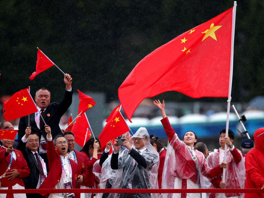 Chinese authorities have arrested a women charged with "maliciously fabricated information and openly slandered" their Olympic delegation. GETTY IMAGES