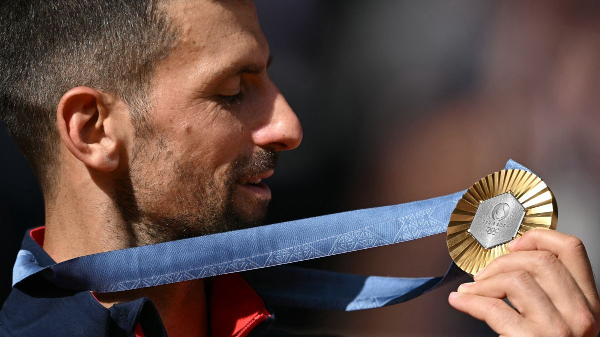 Novak Djokovic poses with his medal in Paris. GETTY IMAGES