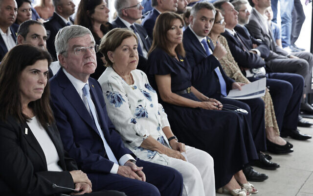 Thomas Bach and Anne Hidalgo attended the memorial service in Paris. AP/Stephane De Sakutin