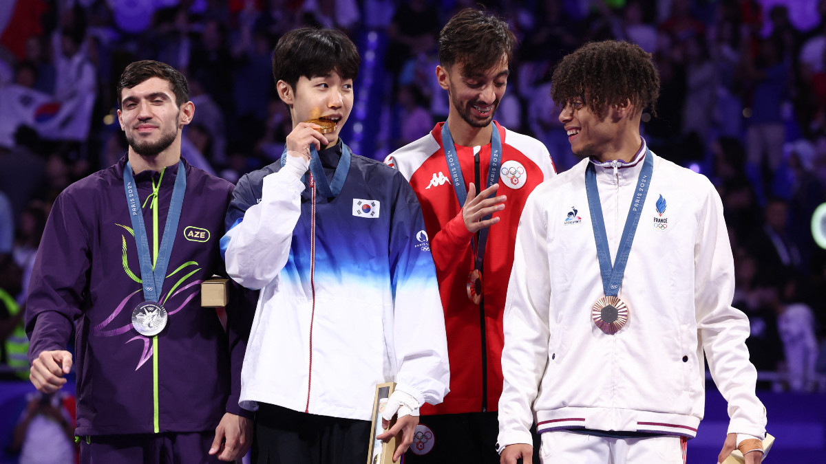 Medallists of the men's -58 kg category. GETTY IMAGES