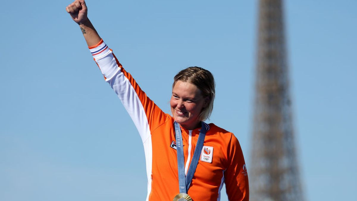 Gold Medalist Sharon van Rouwendaal of Team Netherlands celebrates on the podium during the Marathon Swimming medal ceremony. GETTY IMAGES