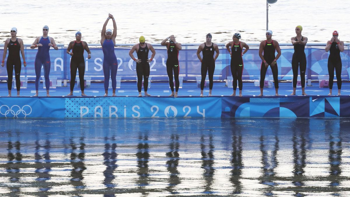 A general view as athletes dive into the River Seine to compete in the Marathon Swimming Women's 10k. GETTY IMAGES