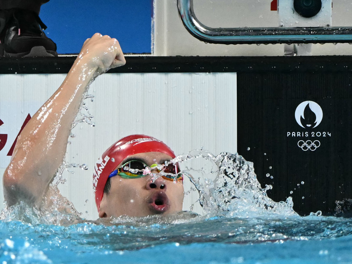 China's Pan Zhanle reacts after winning gold. GETTY IMAGES