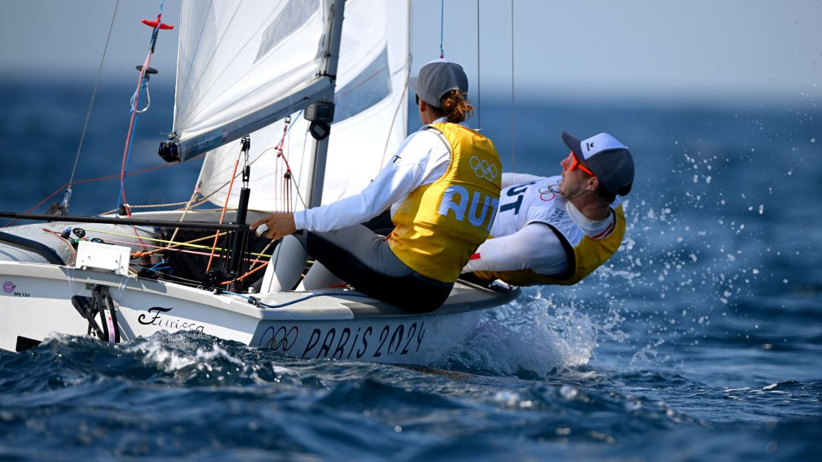 Lara Vadlau and Lukas Maehr compete in the Sailing Mixed Dinghy Medal Race. GETTY IMAGES