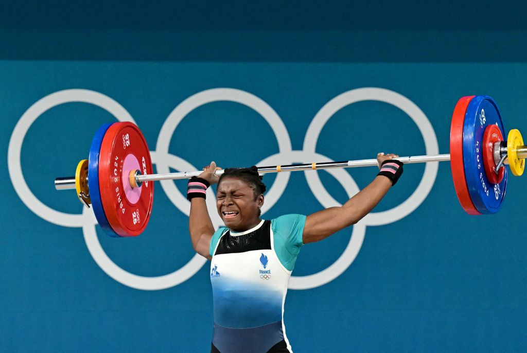 France's Dora Tchakounte competes in the women's -59kg weightlifting. GETTY IMAGES