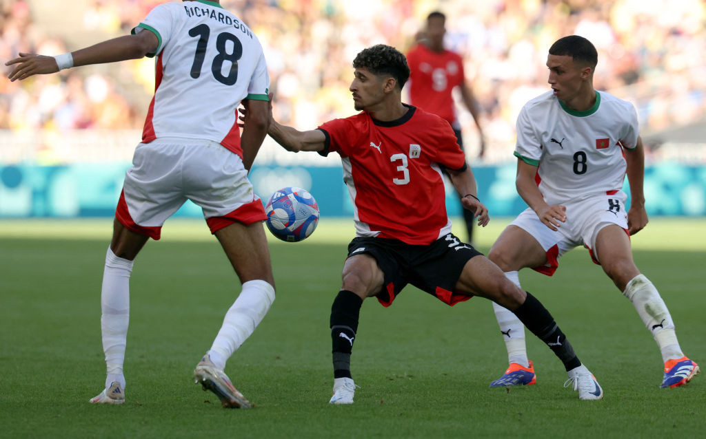 Egypt's midfielder Ahmed Atef challenges Morocco's midfielder Amir Richardson. GETTY IMAGES 