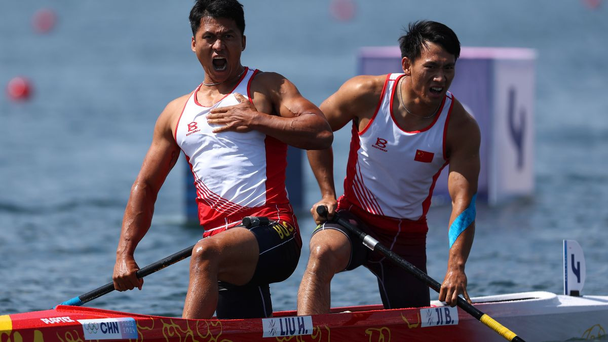 Hao Liu and Bowen Ji celebrate winning the Gold medal. GETTY IMAGES