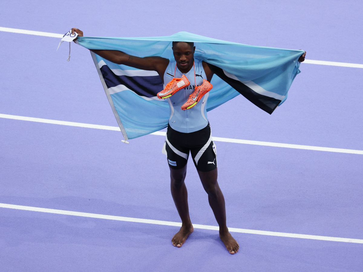 Letsile Tebogo of Team Botswana celebrates winning the gold medal after competing in the Men's 200m Final of the Paris 2024 Olympic Games. GETTY IMAGES