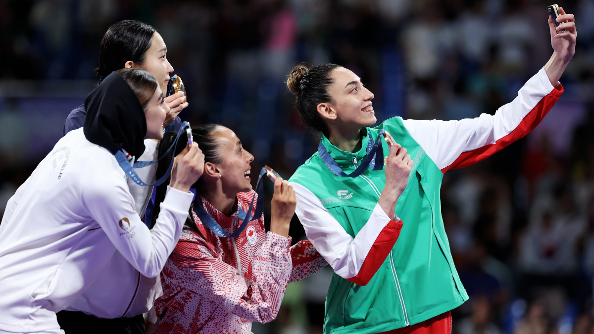 Medallists of the women's -57 kg category. GETTY IMAGES