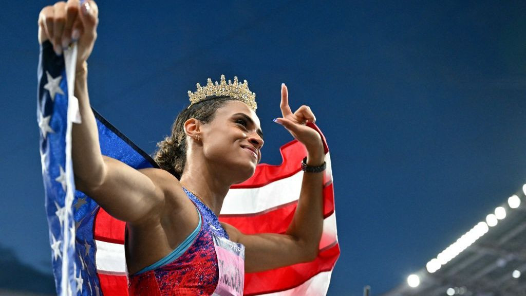 Gold medallist US' Sydney Mclaughlin-Levrone wears a crown as she celebrates winning the women's 400m hurdles. GETTY IMAGES