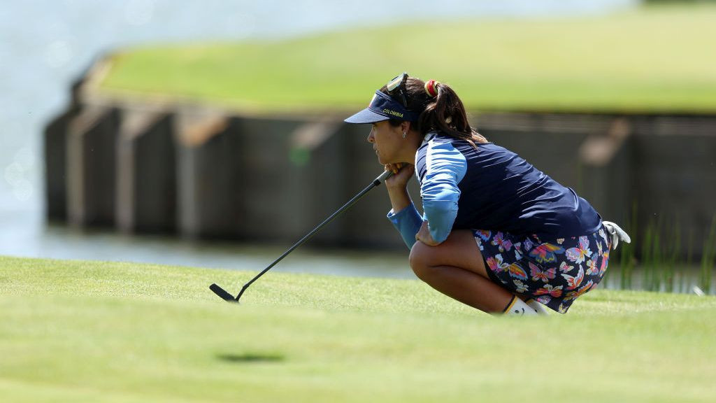  Mariajo Uribe of Team Colombia lines up a putt on the 18th green . GETTY IMAGES