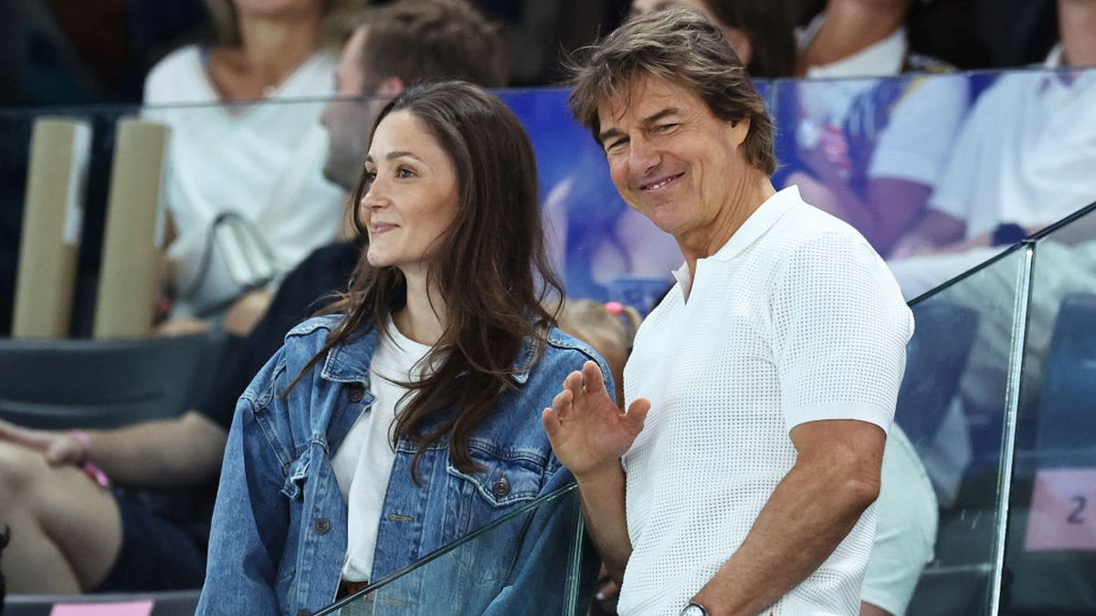 Tom Cruise greets fans during the Artistic Gymnastics Women's Qualification. GETTY IMAGES