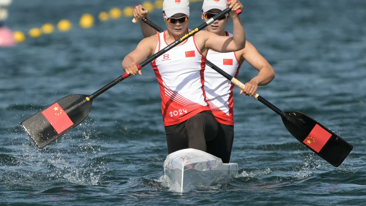 Shixiao and Mengya compete in the women's canoe double 500m final of the canoe sprint competition. GETTY IMAGES