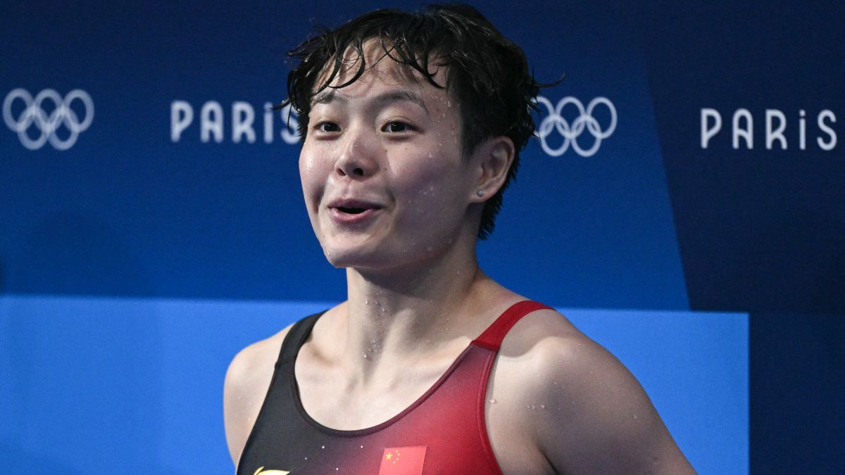 Chen Yiwen reacts after winning the gold medal in the women's 3m springboard diving final. GETTY IMAGES