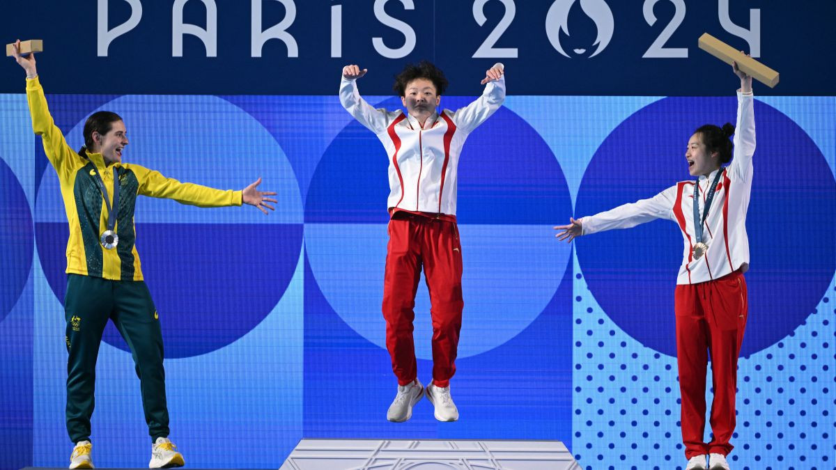 Maddison Keeney, Chen Yiwen and Chang Yani stand on the podium. GETTY IMAGES