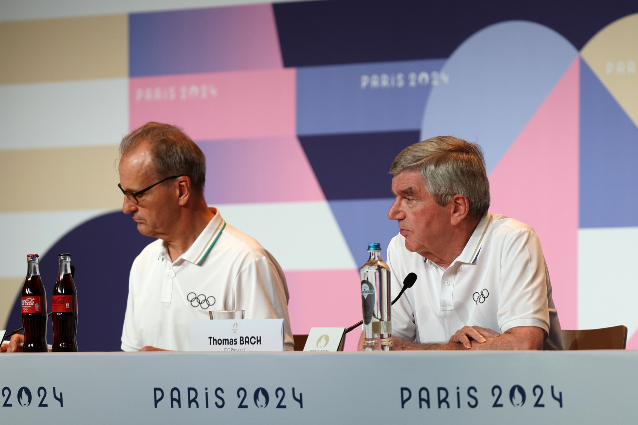 IOC spokesman Mark Adams and president Thomas Bach. GETTY IMAGES