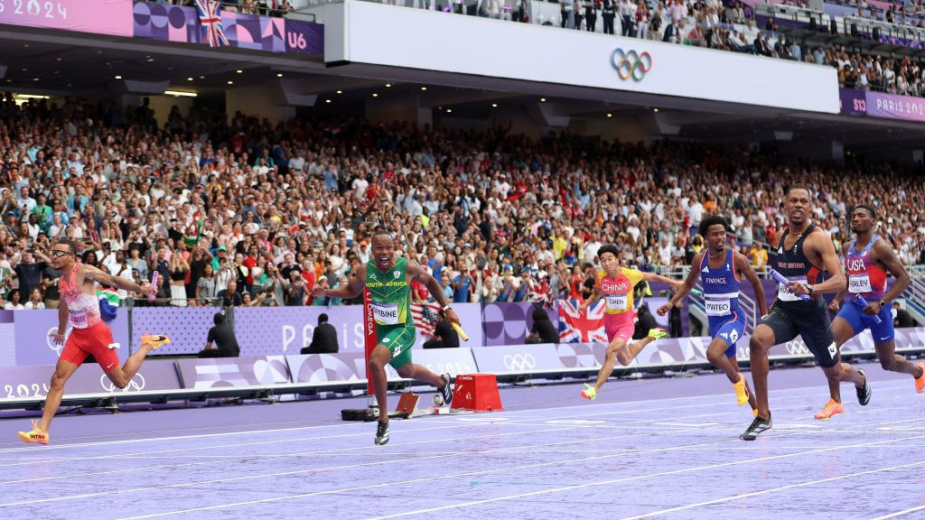 Andre De Grasse of Team Canada crosses the finish line to win the gold medal. GETTY IMAGES