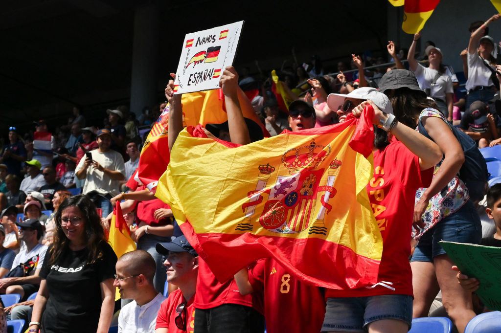 Spanish fans wave a very large Spanish flag during the women s soccer bronze medal small final of the Paris 2024 GETTY IMAGES