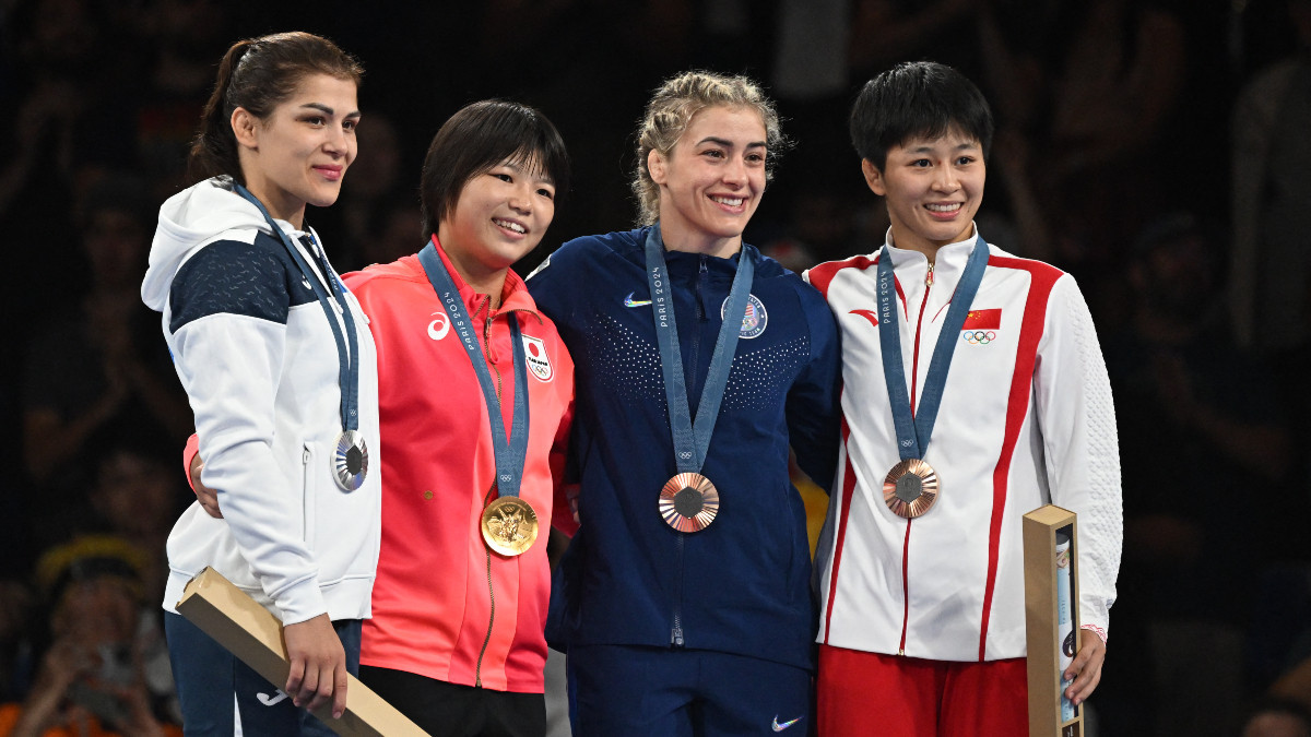 Medallists of the women's -62 kg category. GETTY IMAGES