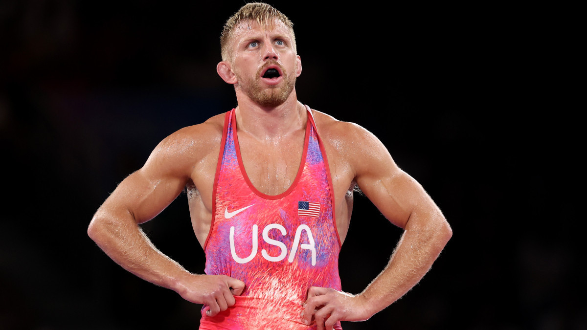 Kyle Dake upset after losing his semi-final bout. GETTY IMAGES