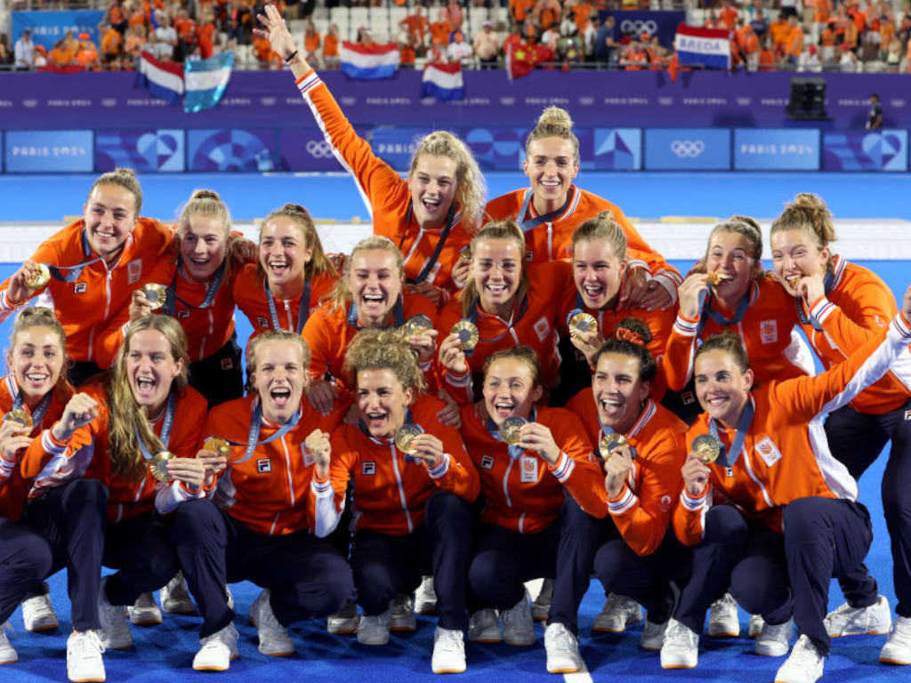 Gold medalists, Team Netherlands pose for a photo during the Women's Hockey medal ceremony GETTING IMAGES