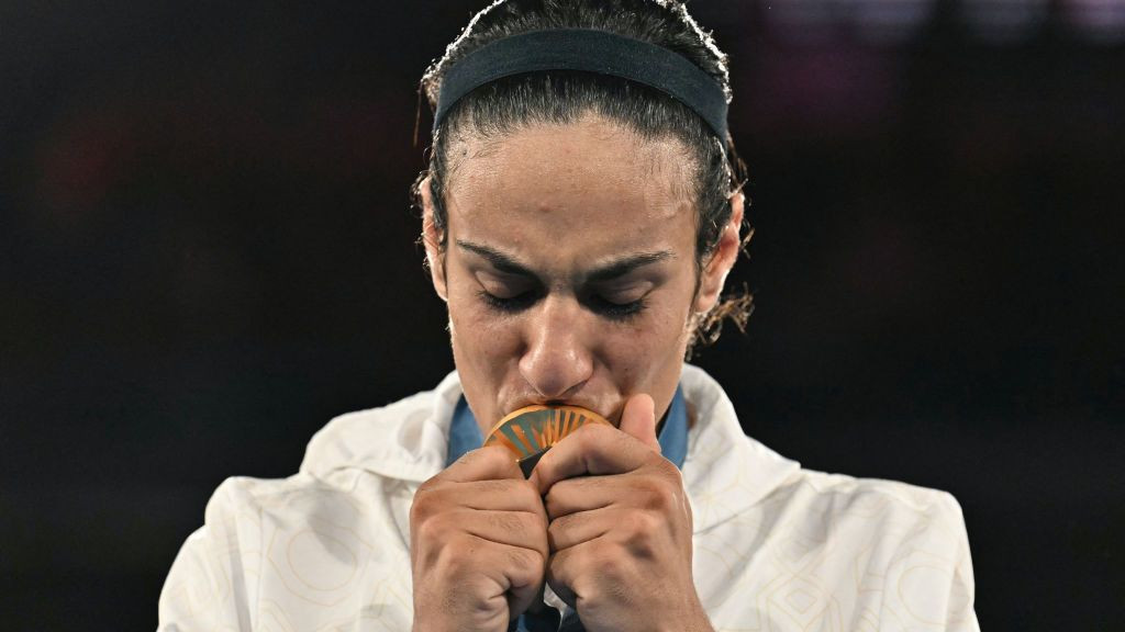 Gold medallist Algeria's Imane Khelif poses on the podium during the medal ceremony. GETTY IMAGES