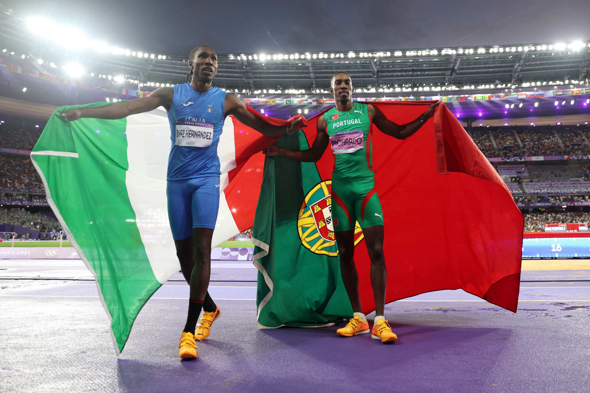 Bronze medalist Andy Diaz of Team Italy and Pedro Pichardo of Team Portugal. GETTY IMAGES